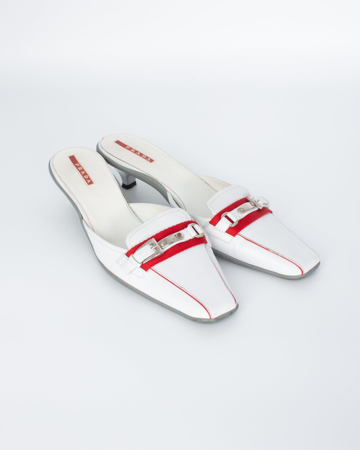 Prada Linea Rossa White Mules