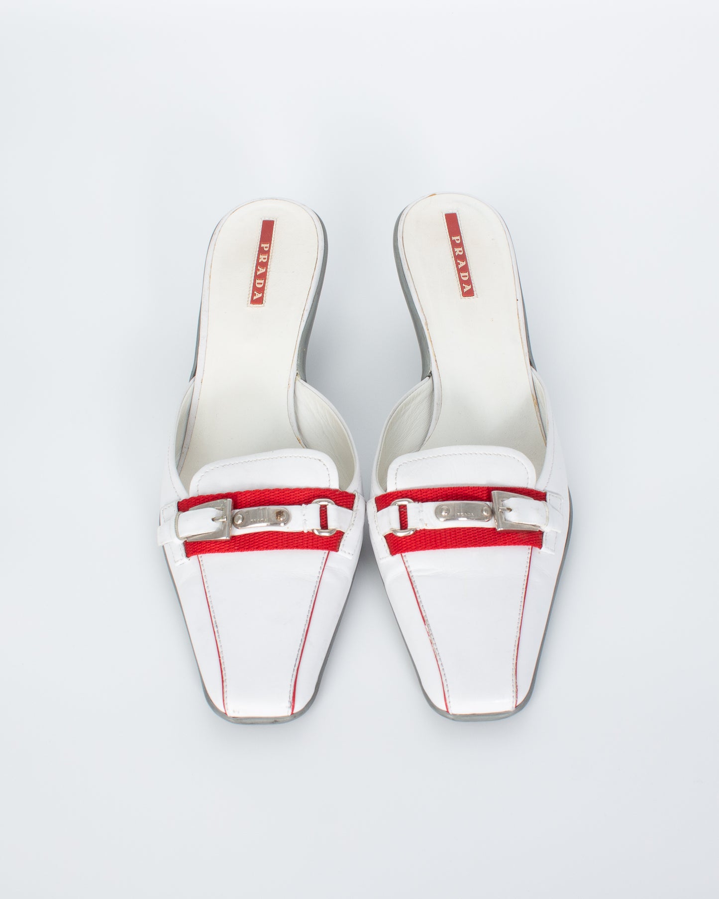 Prada Linea Rossa White Mules