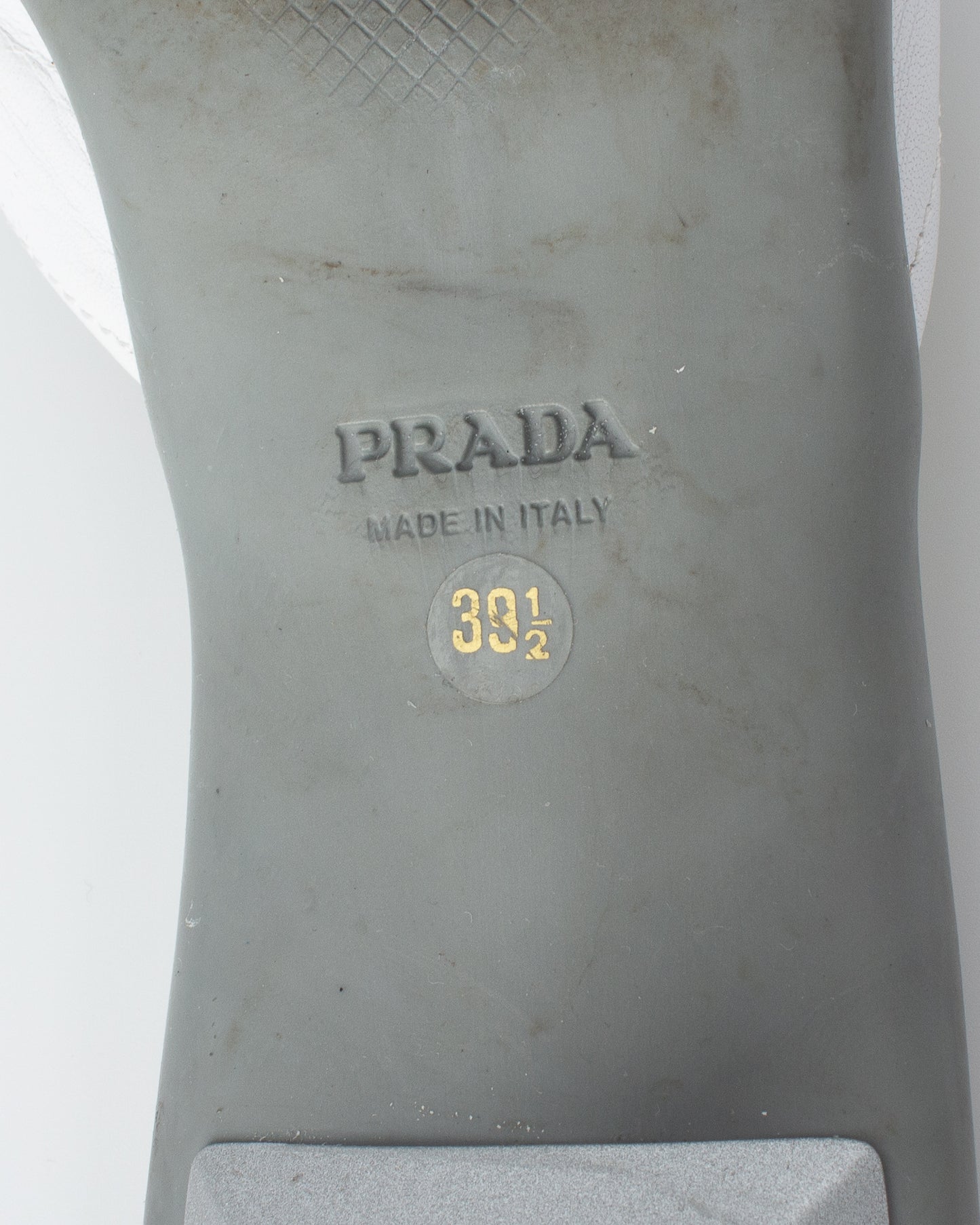 Prada Linea Rossa White Mules