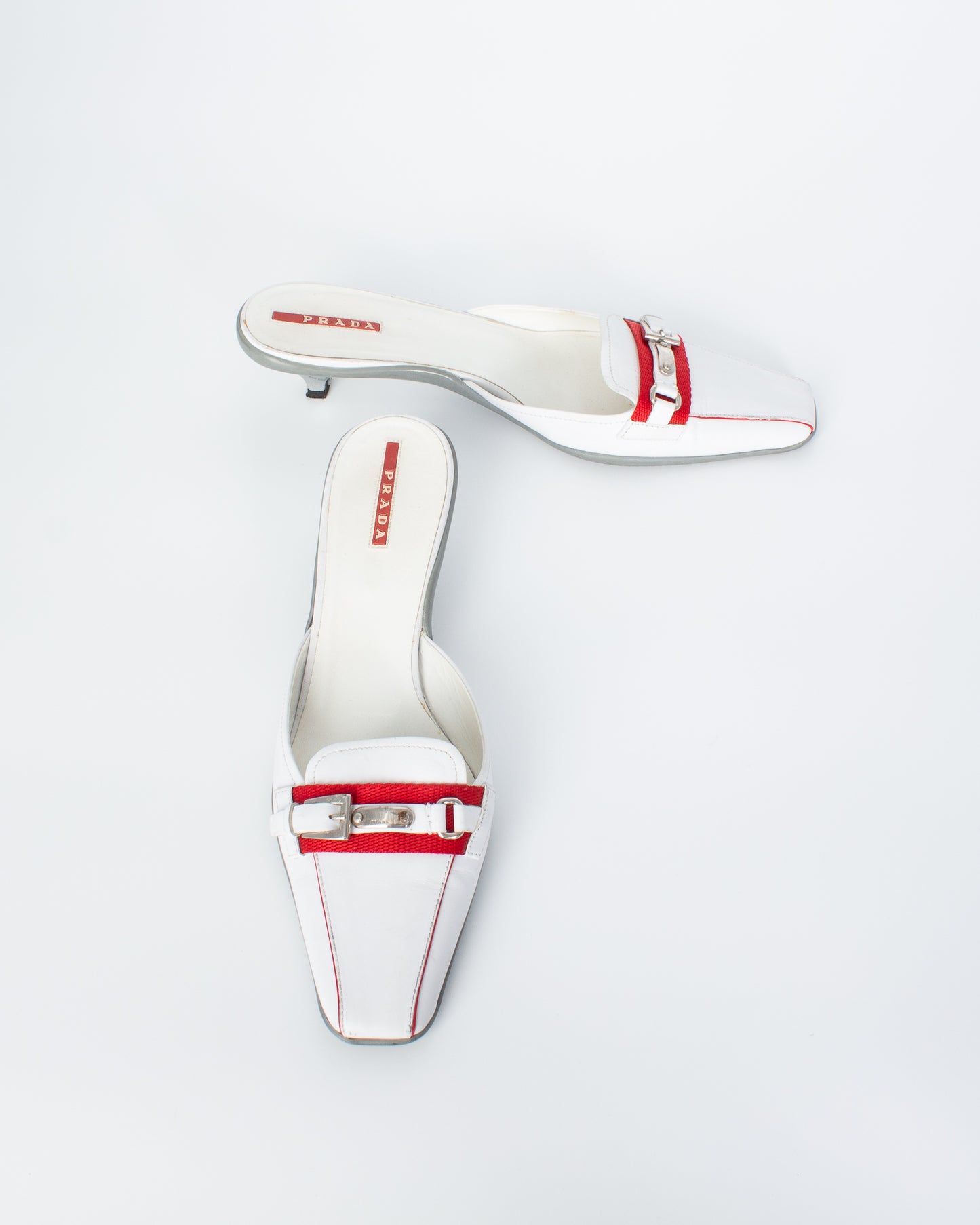 Prada Linea Rossa White Mules