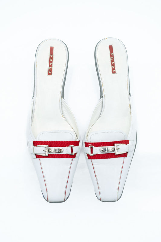 Prada white leather mules with red detail