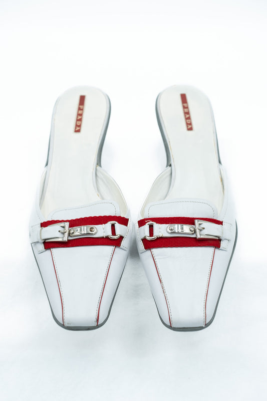 Prada white leather mules with red detail