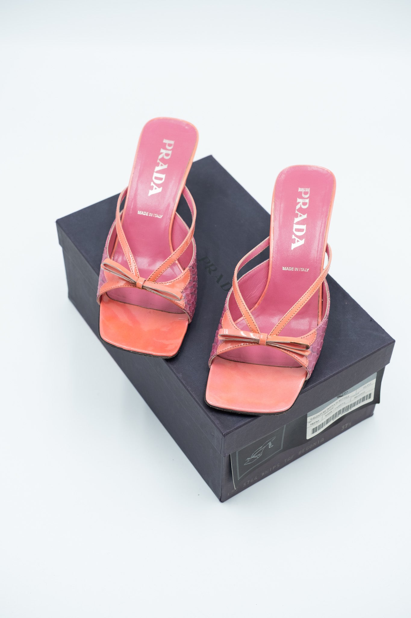 Prada pink mules with python inserts