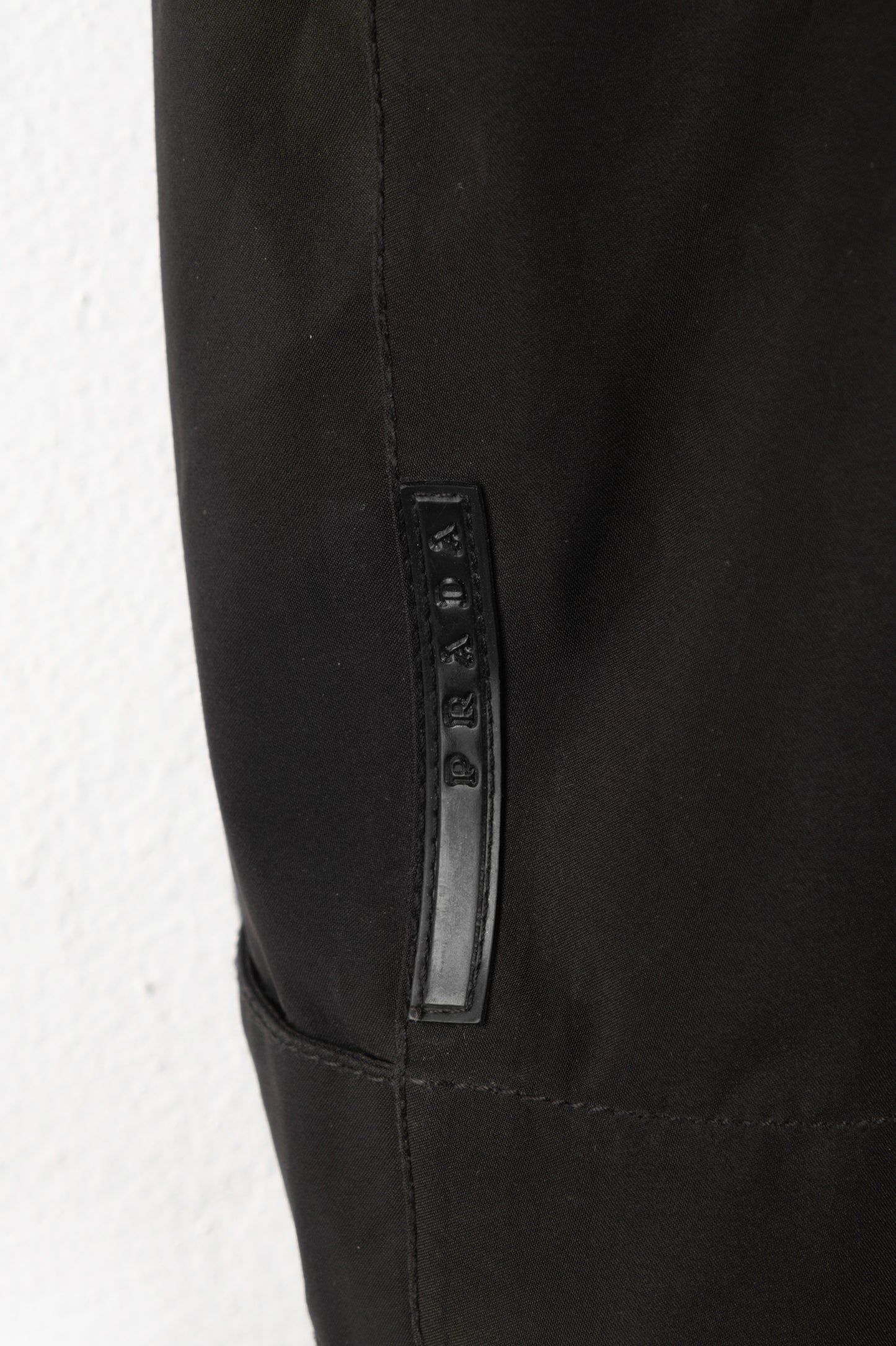 Spolverino Prada in nylon nero da uomo