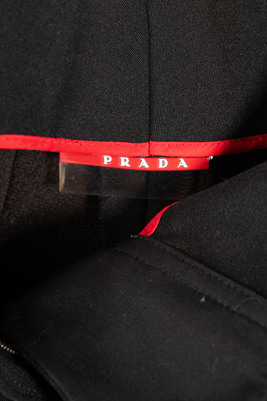 Pantaloni neri con cintura Prada da donna
