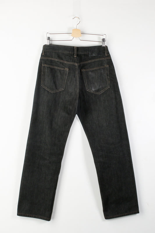 Jeans in denim cimosati neri Gucci