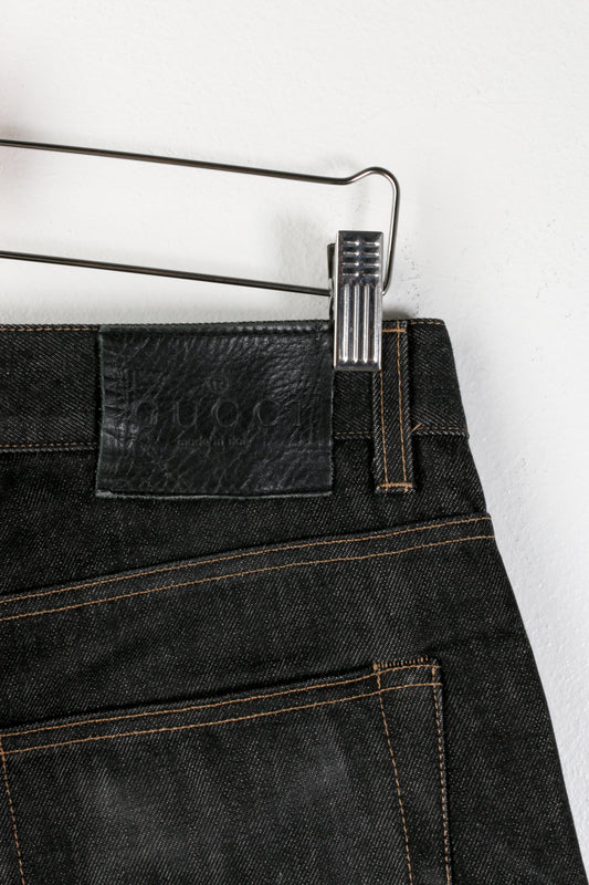 Jeans in denim cimosati neri Gucci