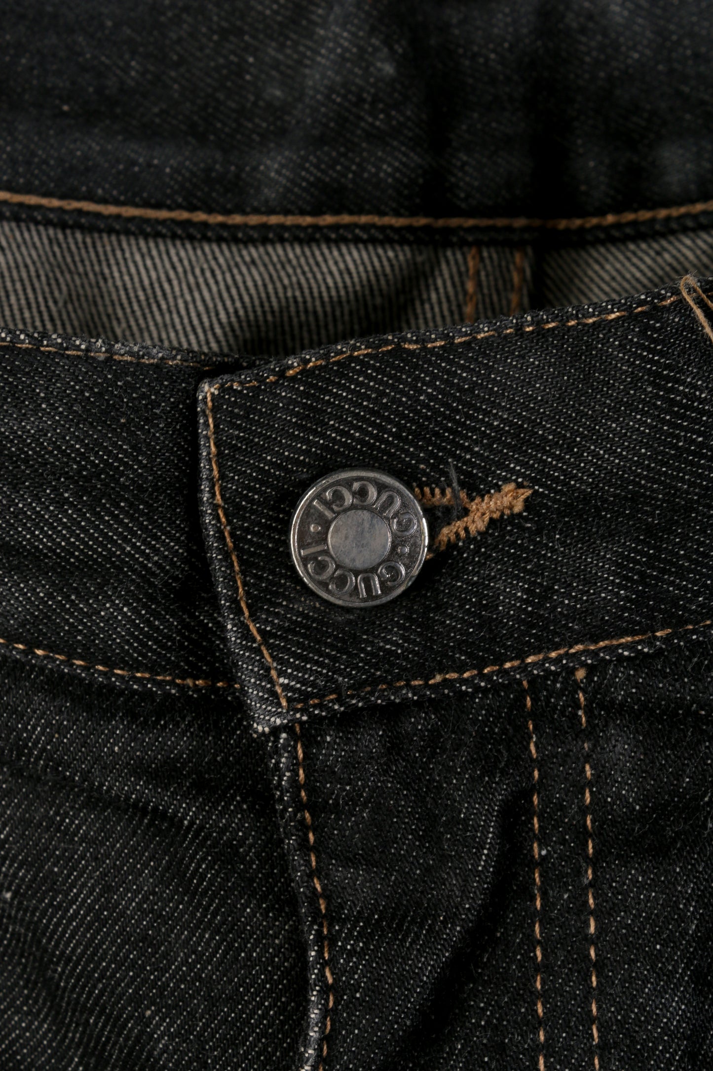 Jeans in denim cimosati neri Gucci