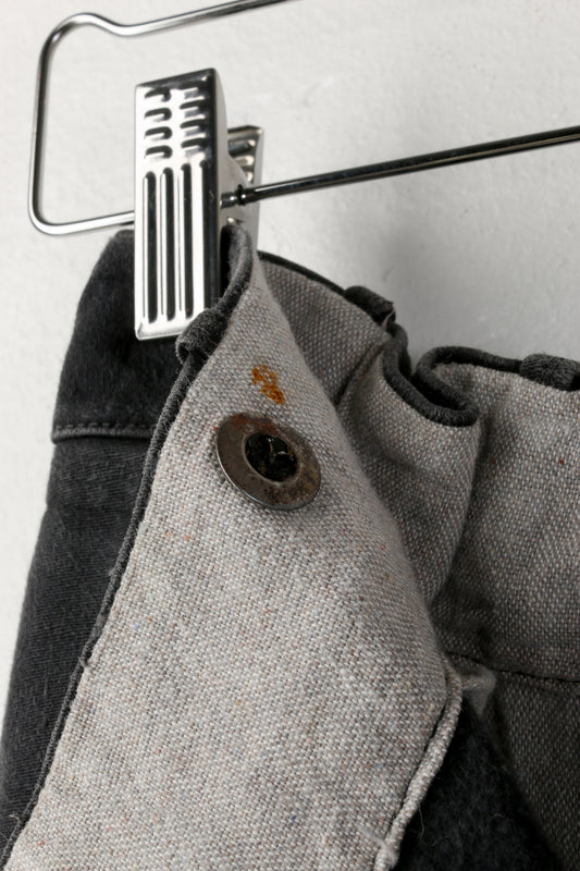 Pantaloni vintage neri scoloriti da uomo